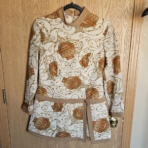 Vintage-Inspired Asymmetrical Dress with Earthy Tones